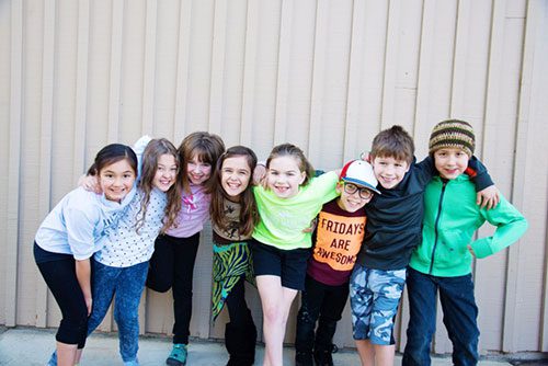 essentials students smiling